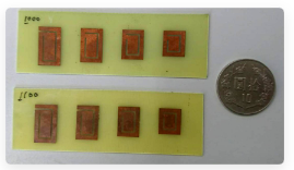 Schematic of the frequency-coded chipless RFID tags that use four emresonators